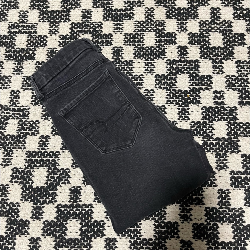 Faded black American eagle next level stretch skinny jeans 0 short